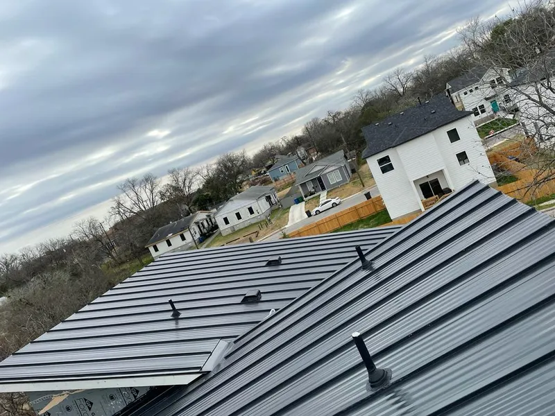 Standing seam metal roof panels with vents for Skylight Repair in Woodcliff Lake
